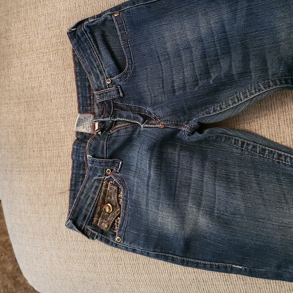 true religion jeans with brown and burgundy stitch